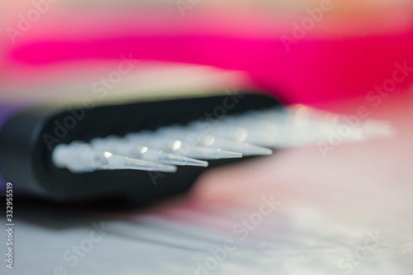 Fototapeta Close up image of laboratory instruments being used to test vaccines and drugs for viruses and DNA