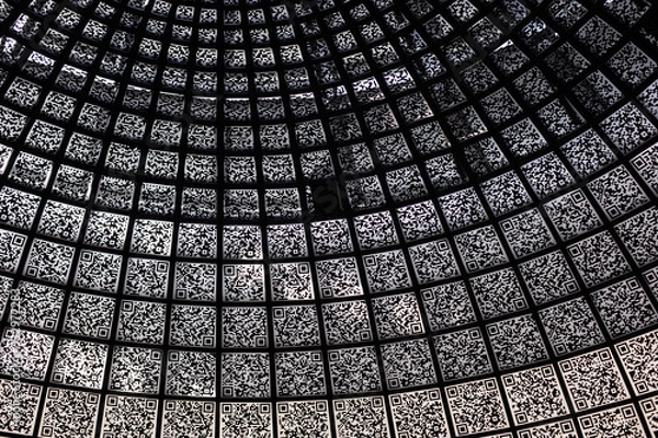 Obraz The pattern on the wall in the form of kbarcode. Abstraction. New technology