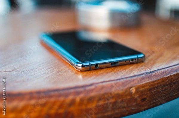 Obraz Mobile phone on table