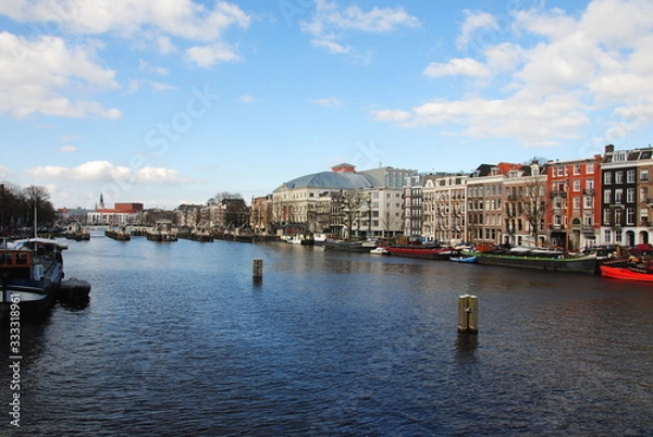 Fototapeta View over the Amstel river on the Amstel locks in the center of Amsterdam