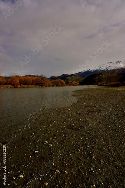 Fototapeta water, landscape, sky, lake, nature, river, clouds, blue, sea, reflection, grass, cloud, sunset, beach, green, view, coast, summer, travel, horizon, ocean, panorama, sunrise, scene, tussock, snow