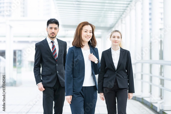 Fototapeta 国際色豊かなビジネスチーム