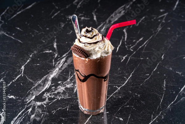 Fototapeta Chocolate milkshake with oreo stock photo