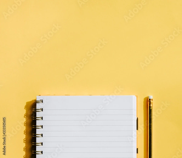 Fototapeta Notebook and pencil.
