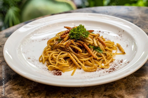 Obraz spaghetti dish prepared with larvae