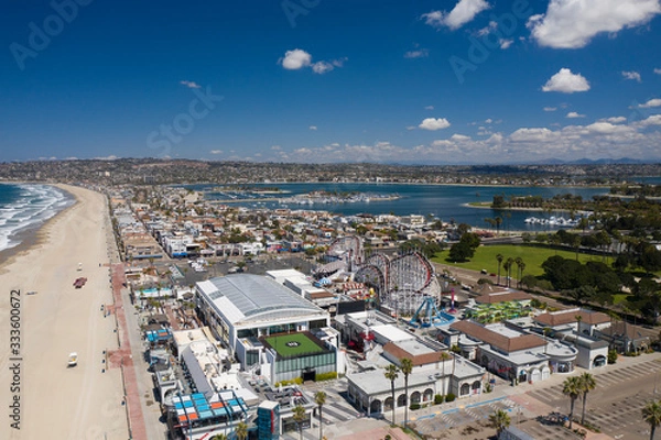 Fototapeta Aerial drone photo of a completely empty Mission Beach due to the Coronavirus and Covid 19 Pandemic. San Diego, Ca, USA.