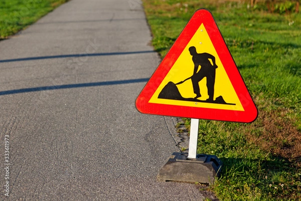 Fototapeta traffic sign depicting man working with roads