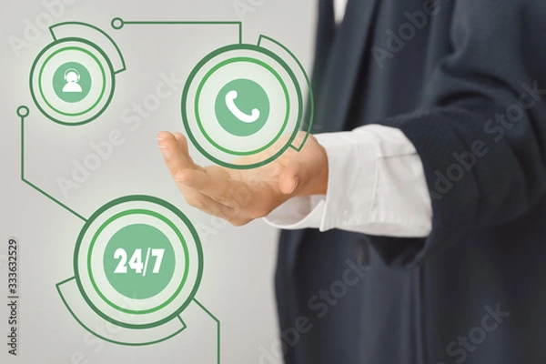 Fototapeta Technical support agent with digital icons on grey background, closeup