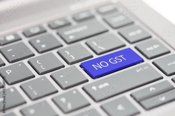 Fototapeta Tax filing, GST, SST, VAT, tax return and tax refund word on keyboard for Taxation related legislation