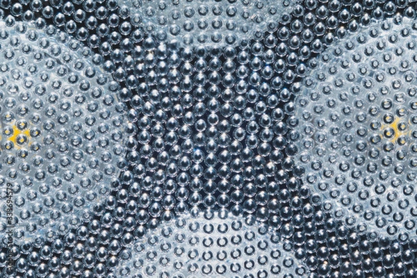 Fototapeta Abstract background with bubbles. transparent led light macro texture. light emitting diode cells close up. lamp diffuser