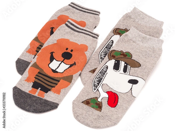 Fototapeta two pairs of unisex socks with funny print isolated on white background.