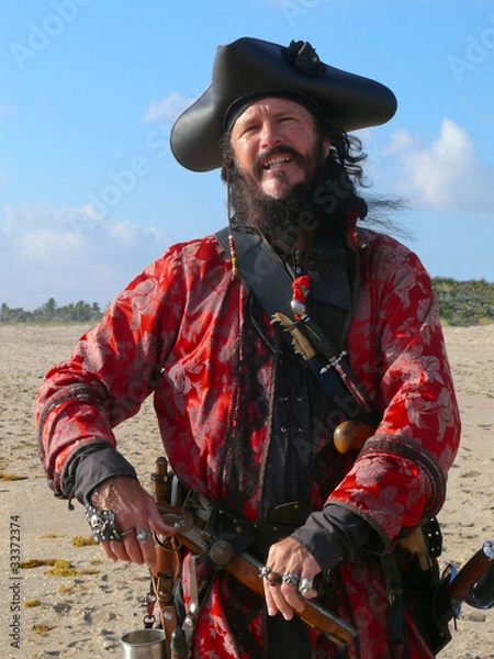 Obraz Pirate with weapons on the beach