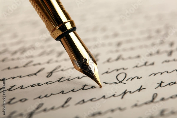 Obraz fountain pen on paper with ink text on a white background