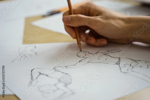 Fototapeta How to draw class of many figure drawing pencil and marker sketches. The artist worskspace with male and female drawings and pencils on the white paper, art, craft, creativity, inspiration, concepts
