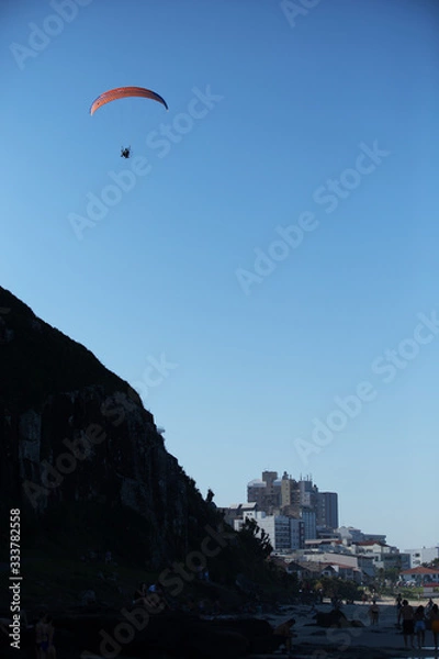 Obraz paragliding and beach