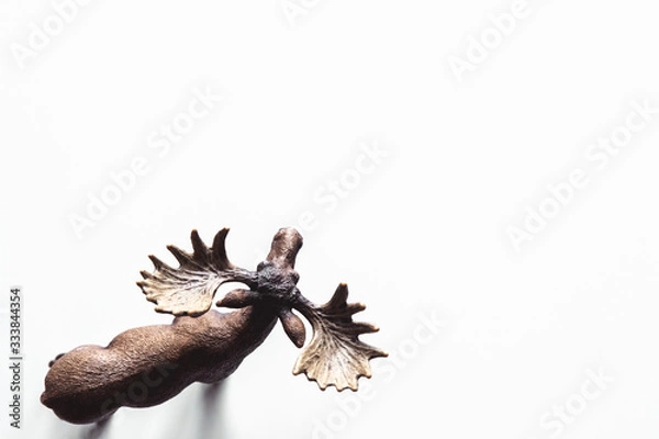 Fototapeta Moose model isolated on white background, animal toys