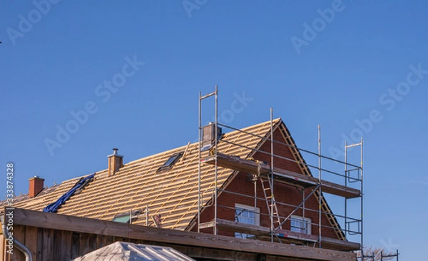 Fototapeta Dachdeckung / Neueindeckung eines Daches