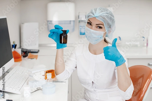 Fototapeta Medical doctor working in research lab. Science assistant making experiments. Laboratory tools: microscope, test tubes, equipment. Chemistry, medicine, biochemistry and healthcare.Covid-19 concept.