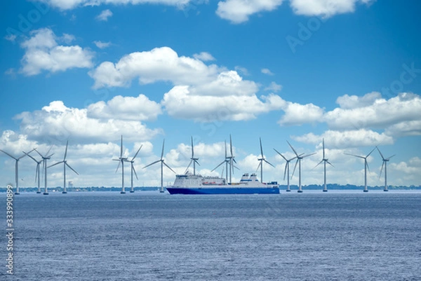Fototapeta Wind turbine plant in the bay