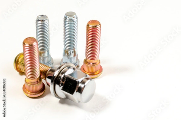 Fototapeta nuts and studs for a car on a table