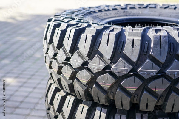Fototapeta closeup view of new mud and terrain tire tread