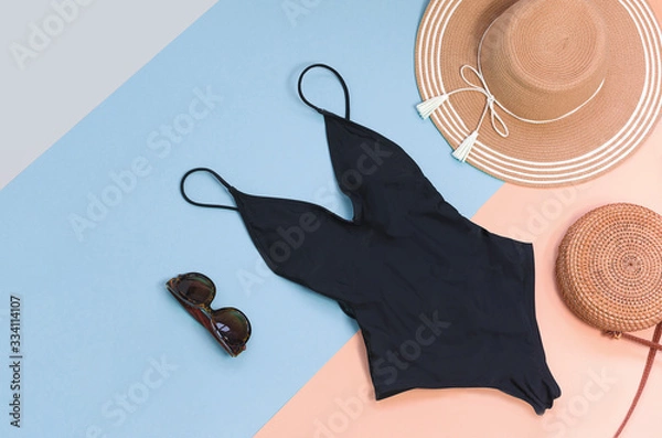 Obraz Swimming suit with sunglasses and straw hat for summer. Flatlay