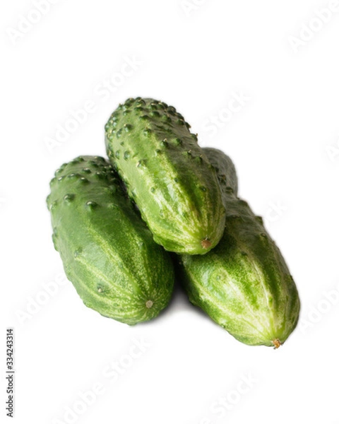 Obraz Image of fresh cucumbers isolated on a white background.