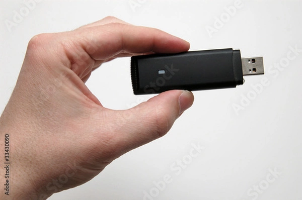 Obraz Hand with a HSPA dongle