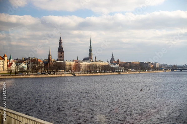 Fototapeta through the bus window old Riga and river