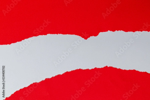 Fototapeta Red torn paper with white copy space.