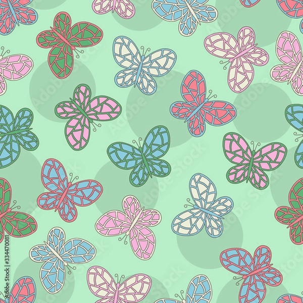 Fototapeta Seamless pattern of abstract multicolored butterflies on a green background