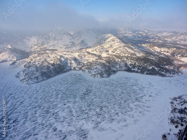 Fototapeta Winter view of the Zhasybay lake. Aerial view of the Bayanaul National Park.  Pavlodar region. Kazakhstan. Asia