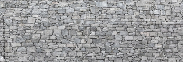 Fototapeta Texture of a stone wall.