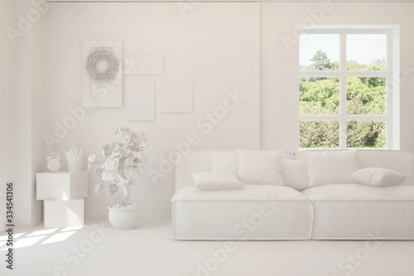 Fototapeta White living room with sofa and summer landscape in window. Scandinavian interior design. 3D illustration