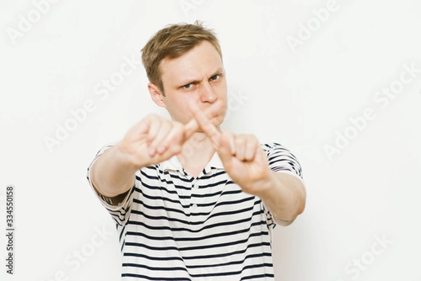 Fototapeta Stop gesture with indignation shown by men
