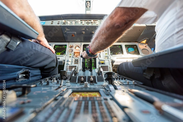 Obraz Cockpit view of an airplane in flight