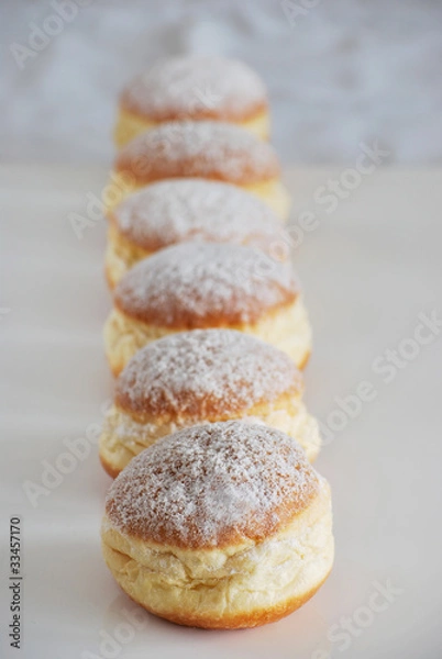 Obraz Krapfen in der Reihe