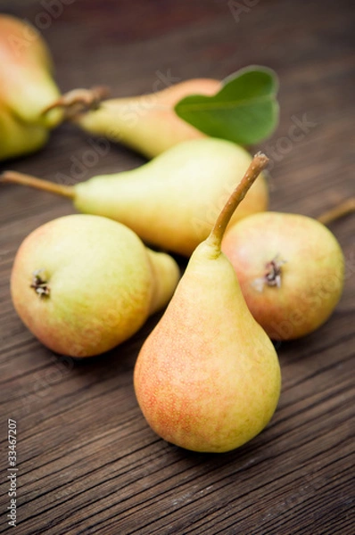 Obraz Organic pears on wooden background