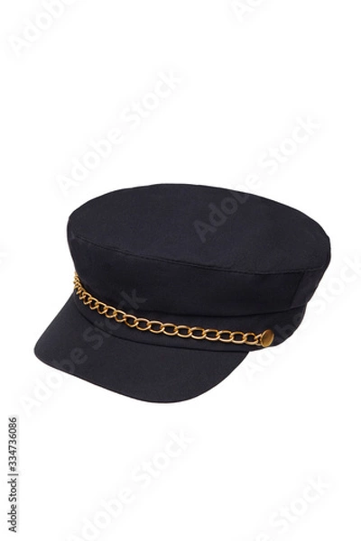 Fototapeta Subject shot of a blue peak cap with a golden chain under the visor. The stylish cloth cap is isolated on the white background.