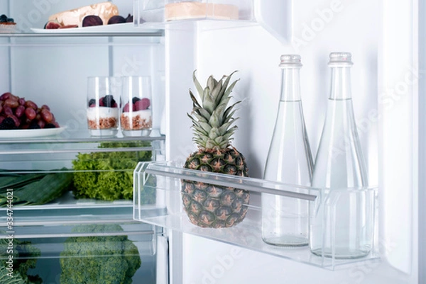 Obraz Open fridge full of fresh fruits and vegetables