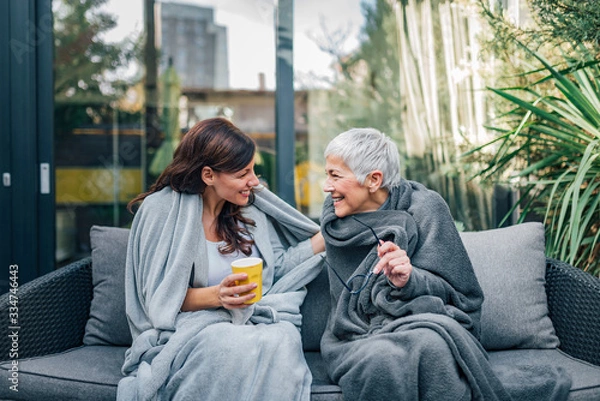Fototapeta Family of different age generations enjoying together in home garden.
