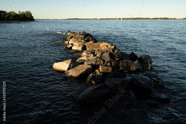Obraz Rocks in the lake at sunset