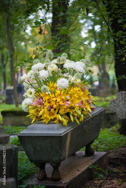 Fototapeta funeral flowr arrangement with lilies and white chrysanthemums