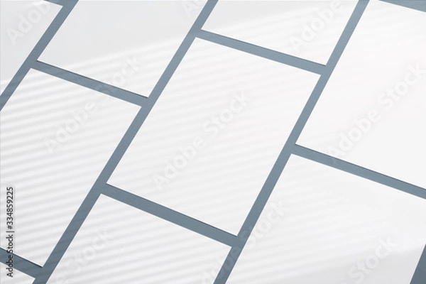 Fototapeta Blank paper poster flyers letterhead on grey background with soft shadows and geometric light overlay as template for design presentation, promotion, portfolios etc.
