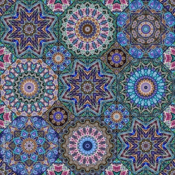 Fototapeta Patchwork seamless pattern with ethnic motifs. Boho chic fabric. Colorful ceramic tiles. Decorative print.