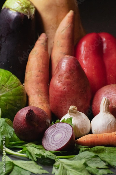 Fototapeta Vegetables on black background