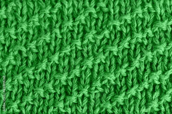 Obraz Knitted blue fabric with diagonal stripes. Woolen cloth.