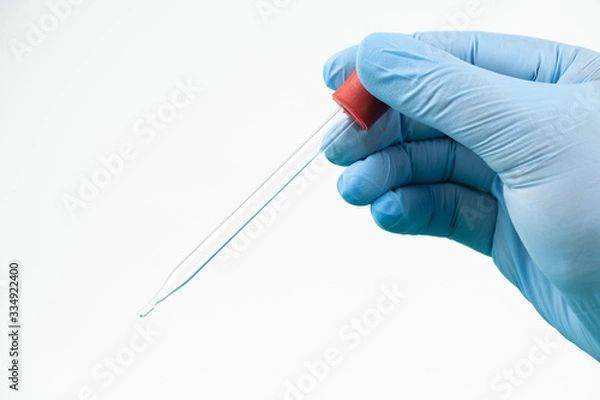 Fototapeta Blank pipette on hand of doctor wear blue glove