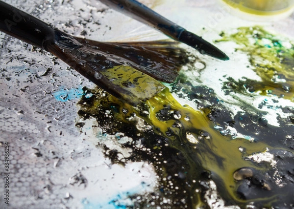 Obraz table and paint brushes, creative process