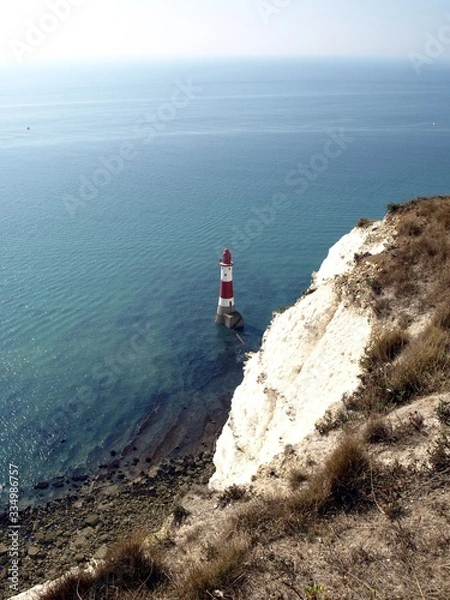 Obraz Beachy head lighthouse at high tide.